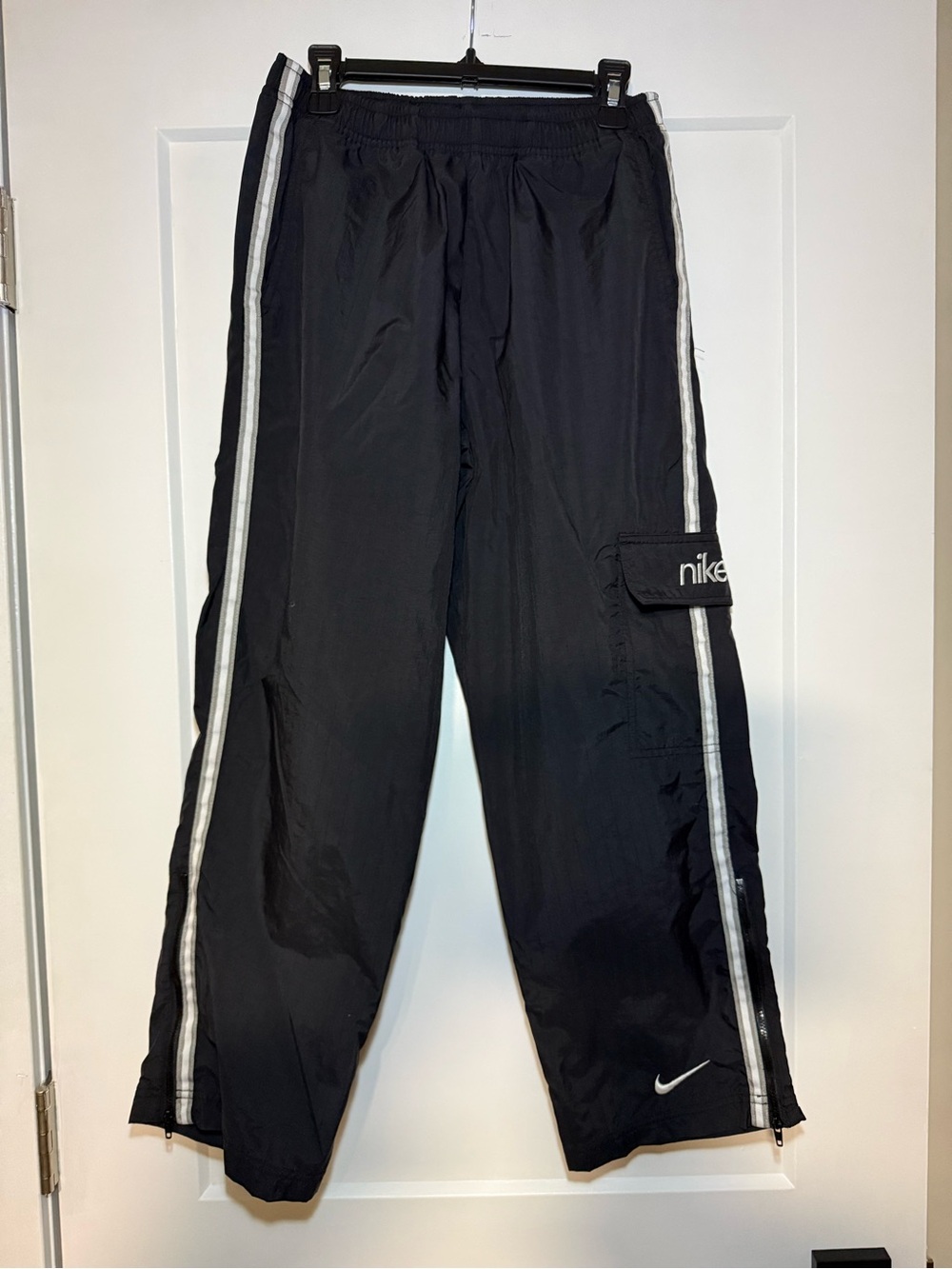 Vintage 90s Nike Black Track Pants with White Side Stripes and Cargo Pocket